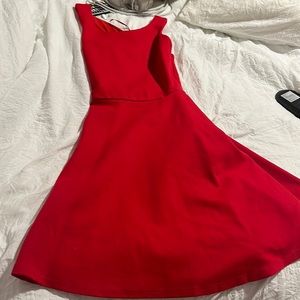 Red float dress. Tiny mark on front
